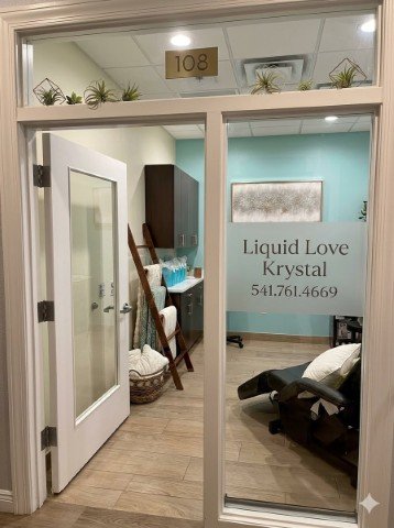 Suite 108 glass-door entrance to Liquid Love Med Spa